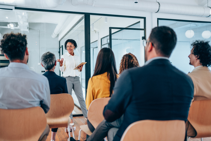 Businesswoman leading a training class for professionals.